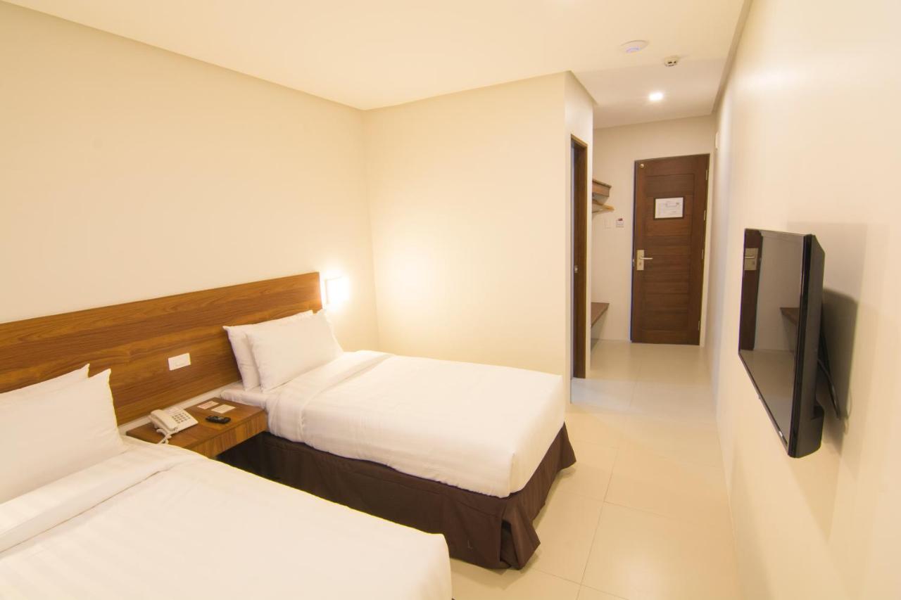 Mango Suites Cauayan Екстериор снимка